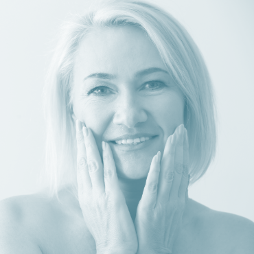 a woman receiving a luxurious facial treatment