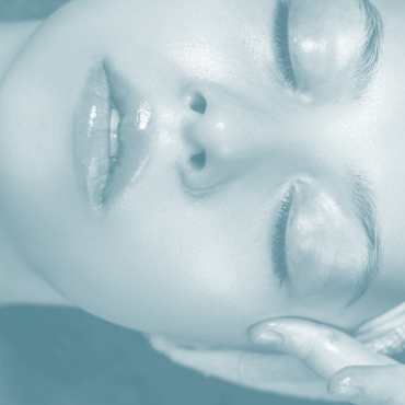 A Woman receiving a relaxing beauty treatment